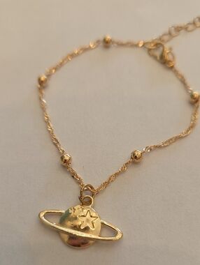 Gold Planet Pendant Bracelet